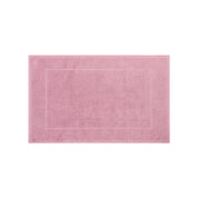 Old pink bath mat