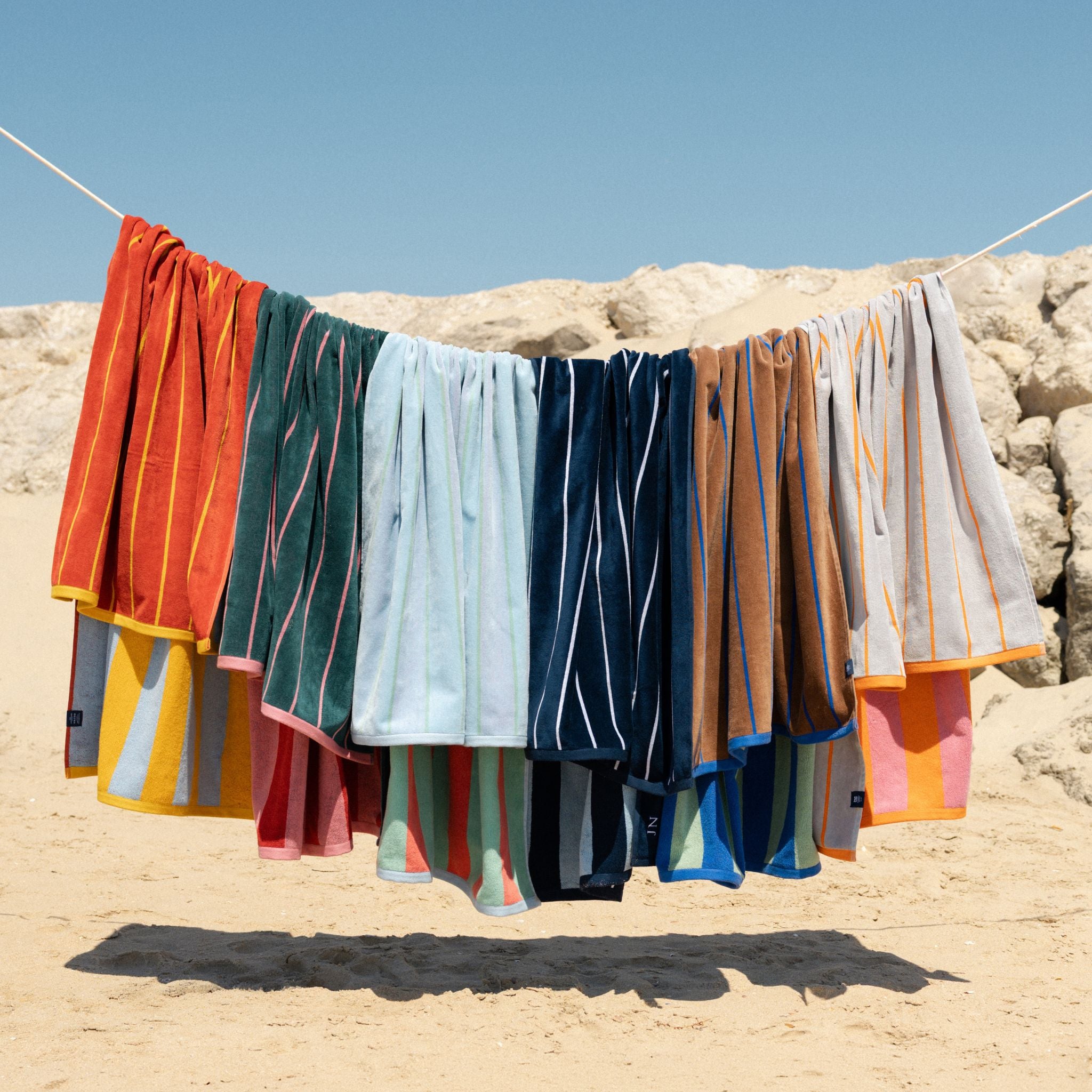 torres-novas-beach-pena-vertical-stripes-towel-multiple-colours-lifestyle-3_8fbd583d-32df-49aa-b3f4-8f966d09265f.jpg