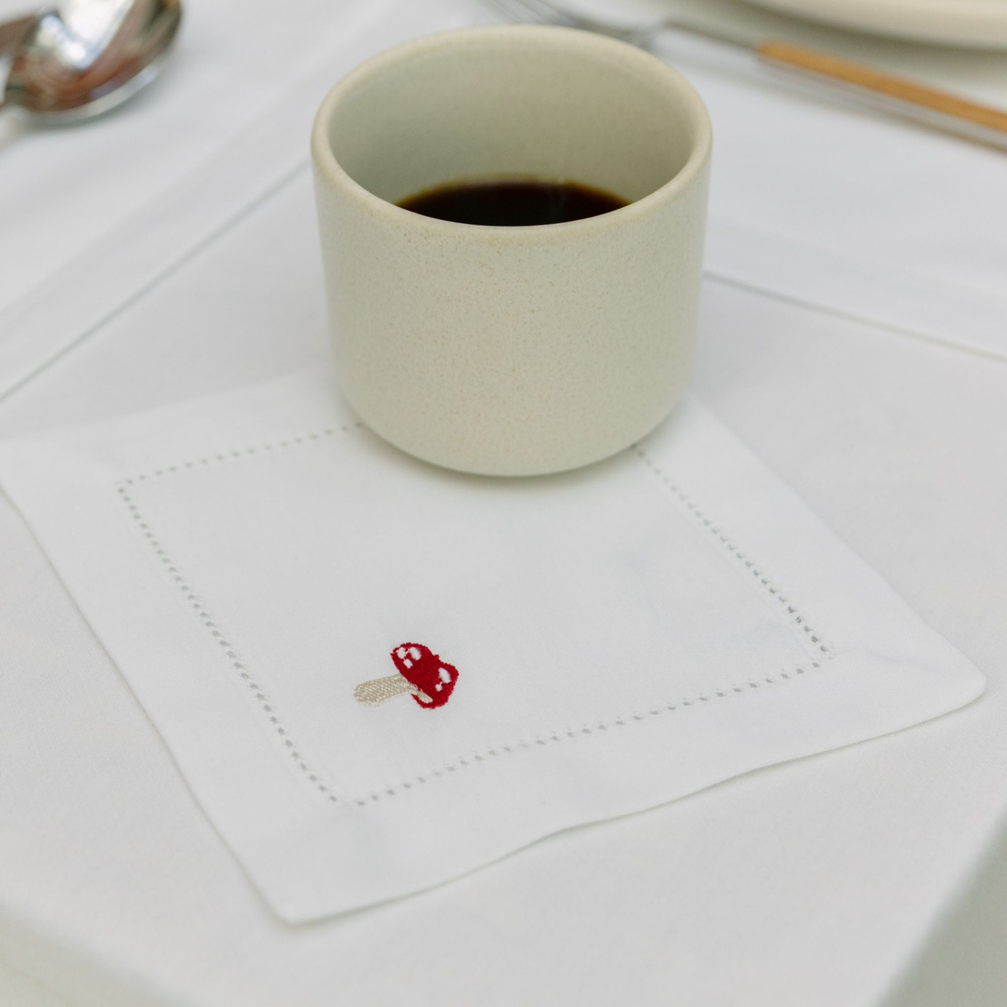torres-novas-table-mafra-cotton-embroidery-fall-cocktail-napkin-mushroom-lifestyle-3.jpg