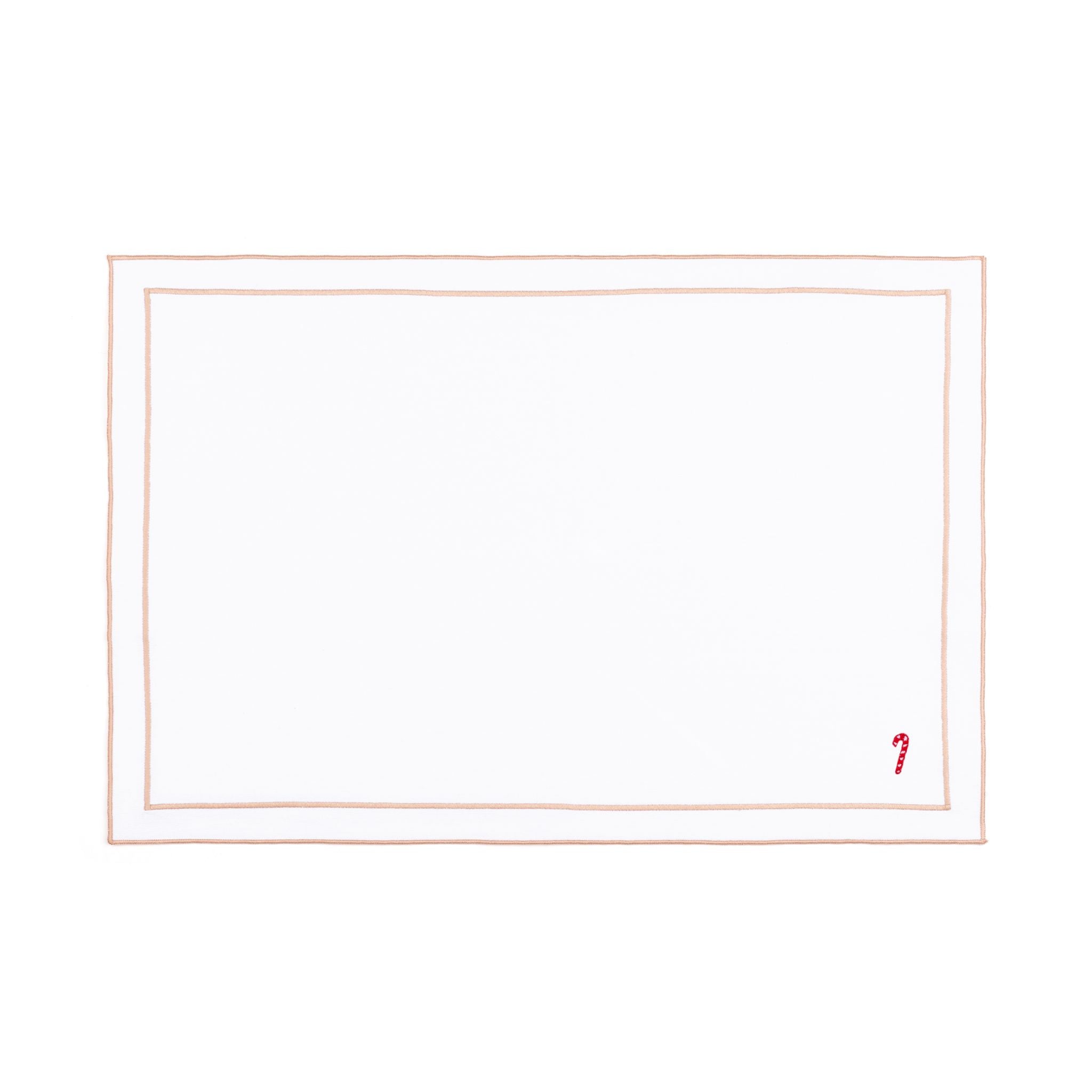 Linge de table Nazaré blanc, en coton, avec des petits motifs de Noël brodés.