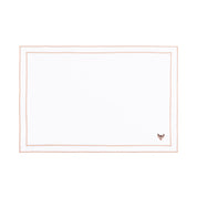 Linge de table Nazaré blanc, en coton, avec des petits motifs de Noël brodés.