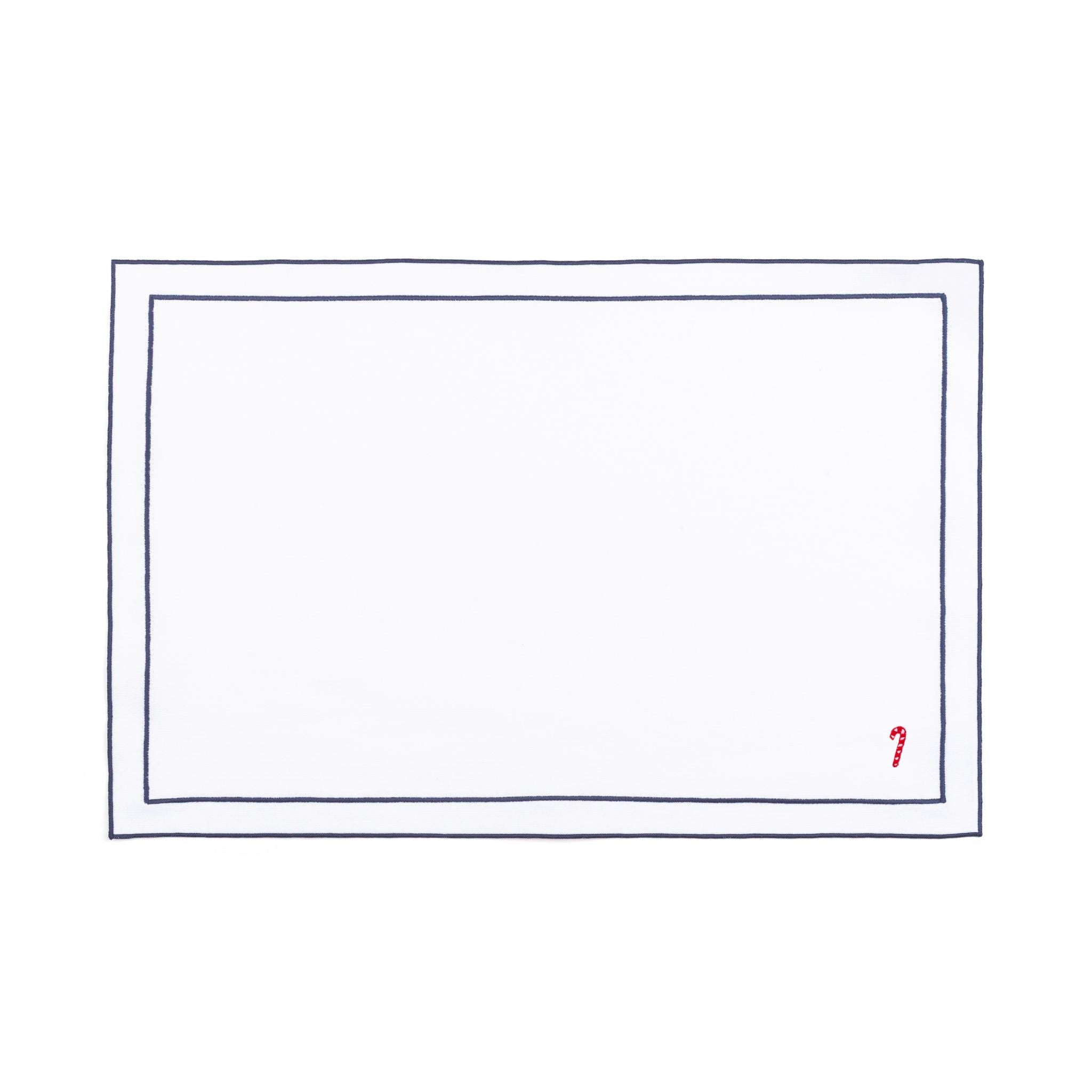 Linge de table Nazaré blanc, en coton, avec des petits motifs de Noël brodés.