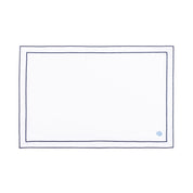 Linge de table Nazaré blanc, en coton, avec des petits motifs de Noël brodés.