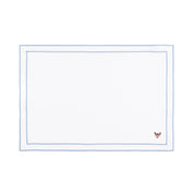 Linge de table Nazaré blanc, en coton, avec des petits motifs de Noël brodés.