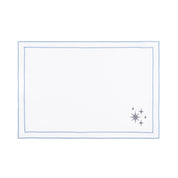 Linge de table Nazaré blanc, en coton, avec des petits motifs de Noël brodés.