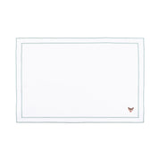 Linge de table Nazaré blanc, en coton, avec des petits motifs de Noël brodés.