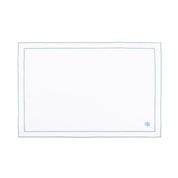 Linge de table Nazaré blanc, en coton, avec des petits motifs de Noël brodés.