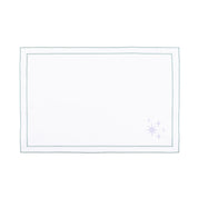 Linge de table Nazaré blanc, en coton, avec des petits motifs de Noël brodés.