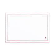 Linge de table Nazaré blanc, en coton, avec des petits motifs de Noël brodés.