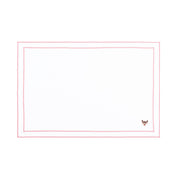 Linge de table Nazaré blanc, en coton, avec des petits motifs de Noël brodés.