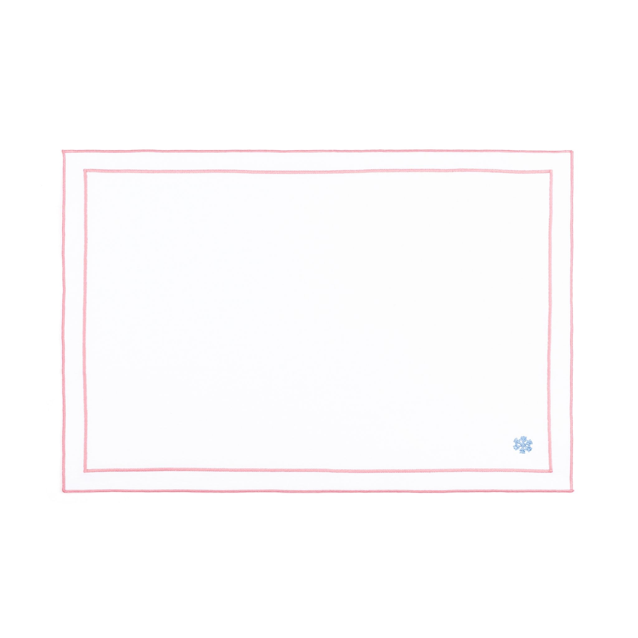 Linge de table Nazaré blanc, en coton, avec des petits motifs de Noël brodés.