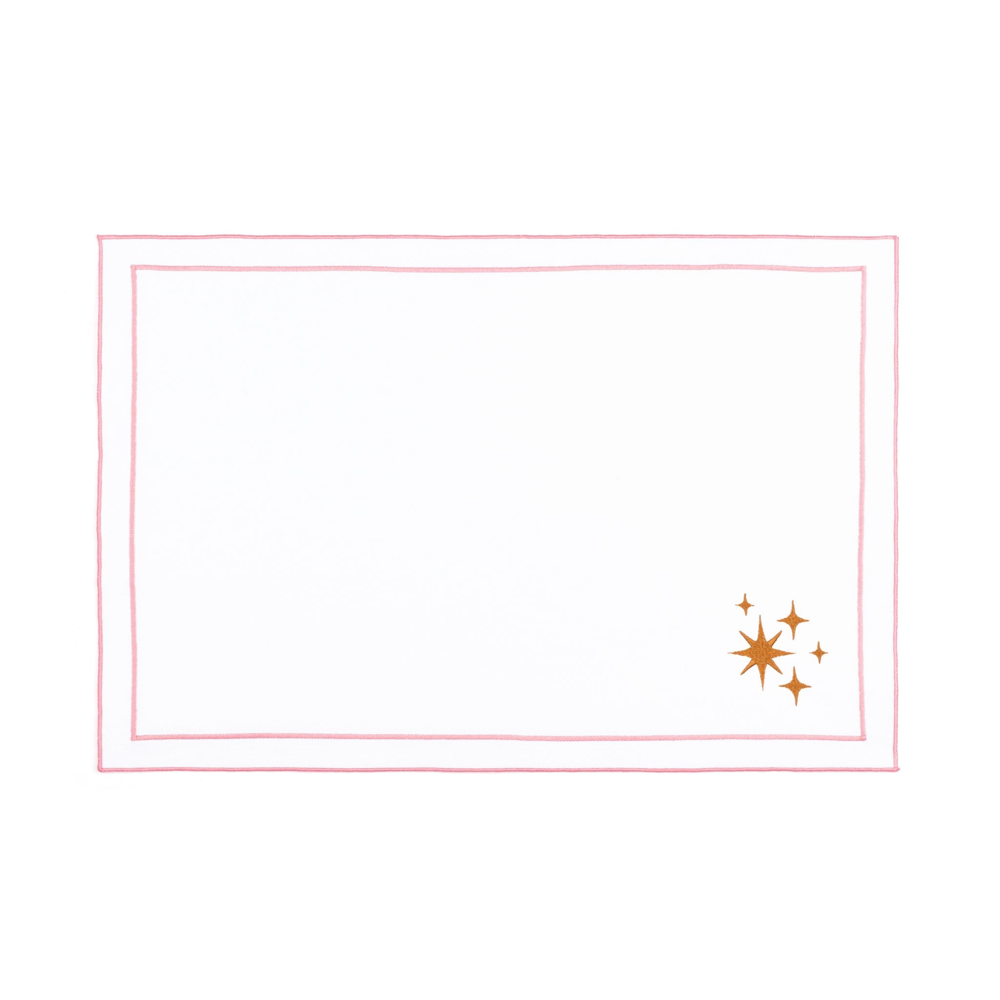 Linge de table Nazaré blanc, en coton, avec des petits motifs de Noël brodés.