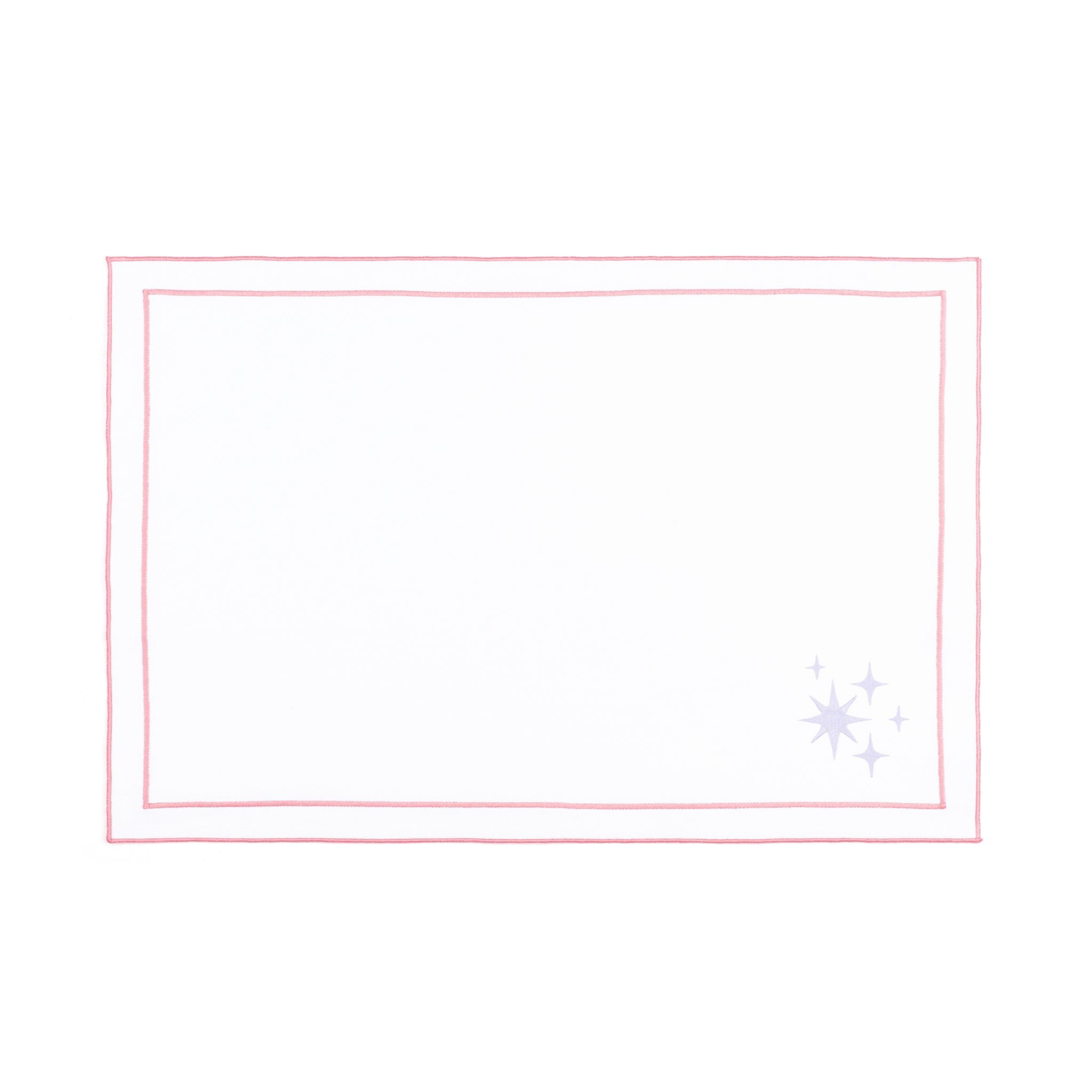 Linge de table Nazaré blanc, en coton, avec des petits motifs de Noël brodés.