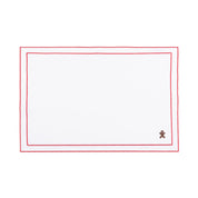 Linge de table Nazaré blanc, en coton, avec des petits motifs de Noël brodés.