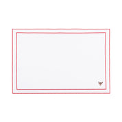 Linge de table Nazaré blanc, en coton, avec des petits motifs de Noël brodés.