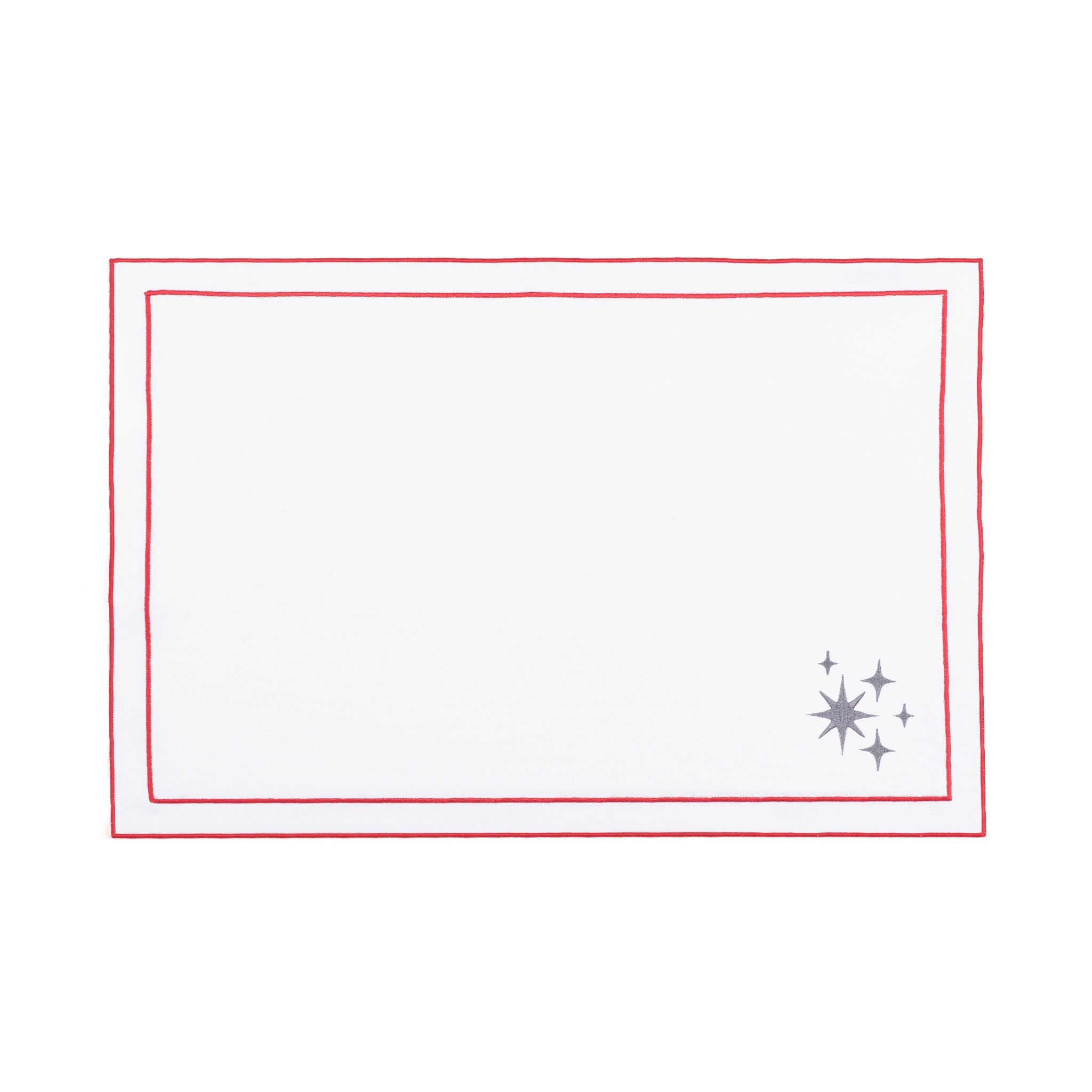 Linge de table Nazaré blanc, en coton, avec des petits motifs de Noël brodés.